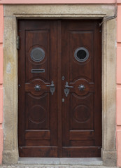Wooden door with forged elements in high resolution