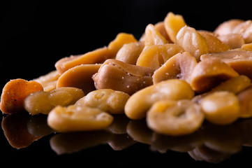 Roasted peanuts, sprinkled with salt