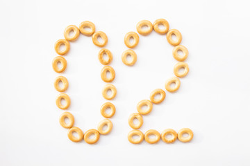 number 02 made from cookies on a white background with space for text. layout for school or diet