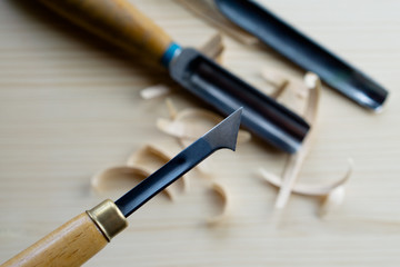 wood carving knife on a desktop background