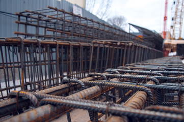 Rebars on the construction site. Building. The use of metal in modern construction.