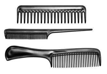Black hair combs isolated on a white background - obrazy, fototapety, plakaty