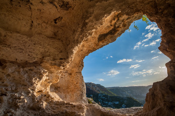 Inside view of a rock-cut tomb in the necropolis of Pantalica in southeast Sicily