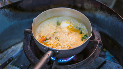 Noodles Cooking in Soup