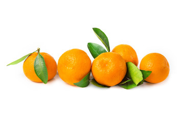 Fresh, bright fruits. Tangerines with leaf on a white isolated background.