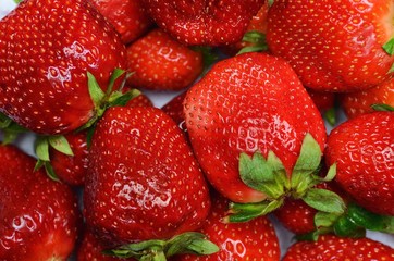 juicy ripe red strawberries on a white background