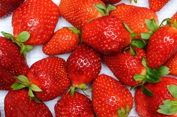 juicy ripe red strawberries on a white background