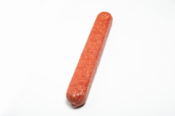 appetizing salami whole sausage stick isolated on white background