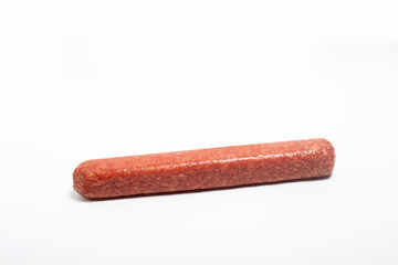 appetizing salami whole sausage stick isolated on white background