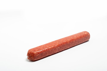 appetizing salami whole sausage stick isolated on white background