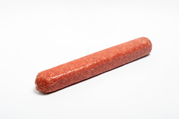 appetizing salami whole sausage stick isolated on white background