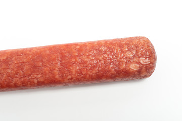 appetizing salami whole sausage stick isolated on white background