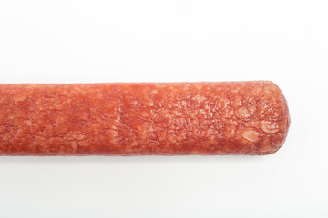 appetizing salami whole sausage stick isolated on white background