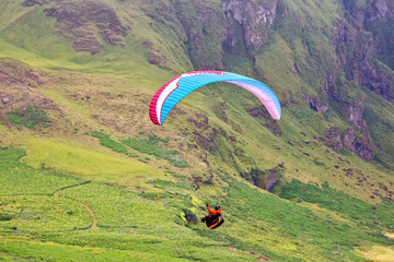 Paraglider flying in Iceland. Nature and places for wonderful travels