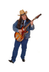 Middle age man standing playing the guitar