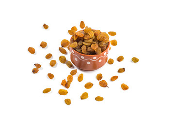 Dried Raisins in a clay Bowl on white background