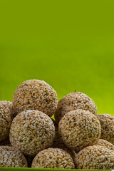 Amaranth or Rajgira laddu, Cholai ke laddo in green plate on green background