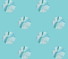 Geometric seamless pattern. Holes on a light green background. Satin or silk fabric with large folds is visible in the hole. Layout template for design, textile industry, wallpapers, backgrounds.