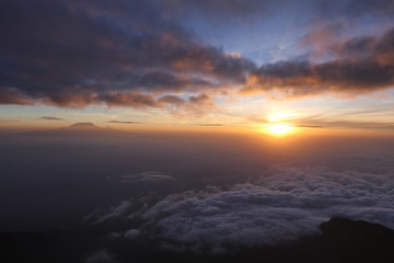 Fototapeta na wymiar Sunrise over Kilimanjaro, view from Mount Meru Summit, Tanzania, Africa 