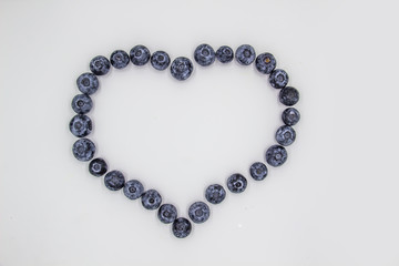 A Blueberry Heart. The heart's frame from the berries. Beautiful blueberries making a heart frame.