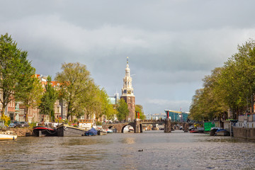 Montelbaan tower in Amsterdam, Netherlands, view from the canal