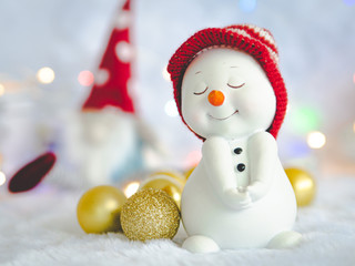 snowman on background of snow