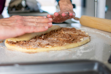 rolling cinnamon roll dough 
