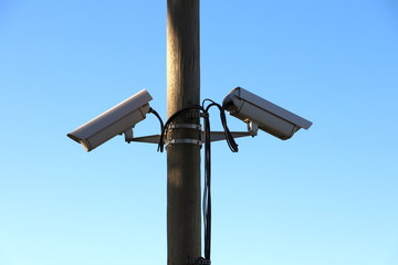 Security Video Cameras on the wooden post