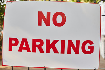White sign saying "No parking" in India, Panaji