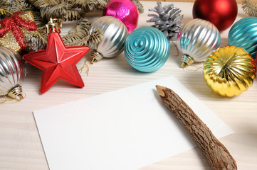 Christmas white wooden pattern with Christmas tree branches and toys
