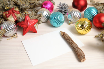 Christmas white wooden pattern with Christmas tree branches and toys