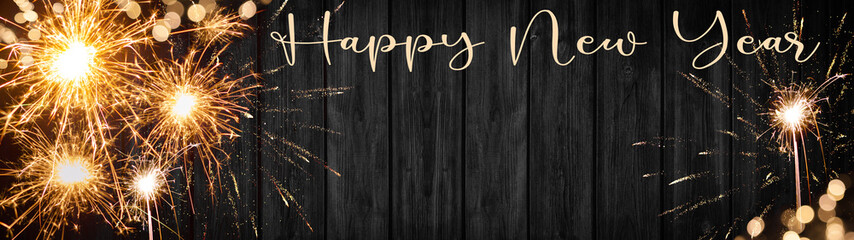 Happy New Year 2024 - Silvester background banner panorama long- sparklers fireworks and bokeh...