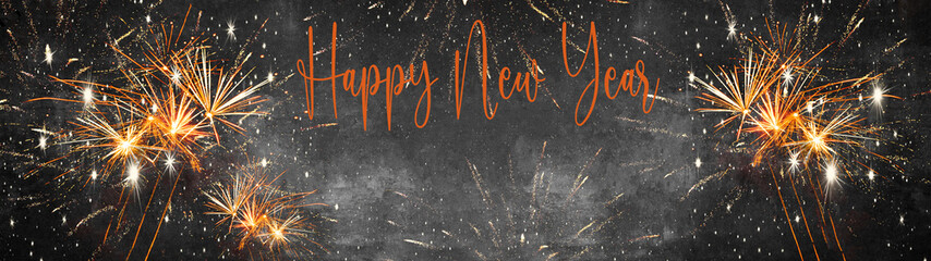 Fototapeta na wymiar Happy New Year - Silvester background banner panorama long- firework on rustic dark black grey stone concrete texture, top view with space for text