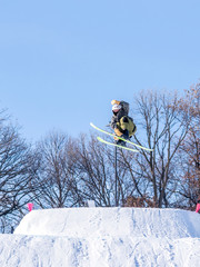 People are having fun in downhill skiing and snowboarding	