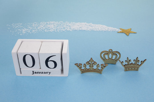 Epiphany Day Concept. 6 January calendar with tree kings crown on blue background