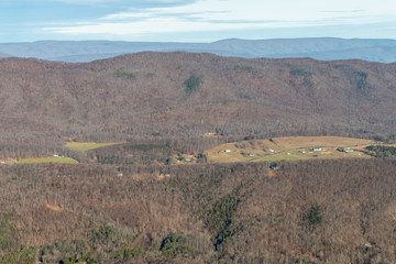 Telephoto view of a valley with houses in Appalachian mountains