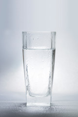 A glass of water photographed against the light