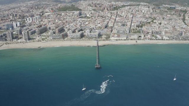 4k ungraded drone Aerial view of Pont del Petroli, Badalona in Barcelona, Spain
