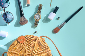 Blogging Beauty Concept. Professional female makeup accessories, watches, bracelet, sunglasses and...