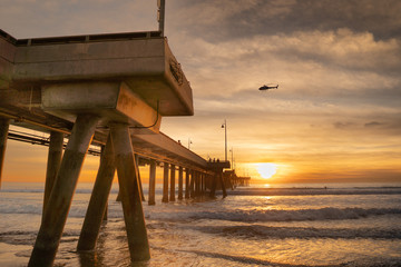 Pier Sunset with Helicopter