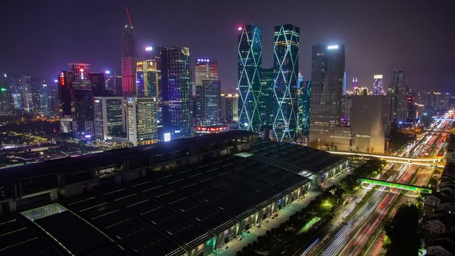 Timelapse famous Shenzhen Exhibition Center roof of Futian zoom out