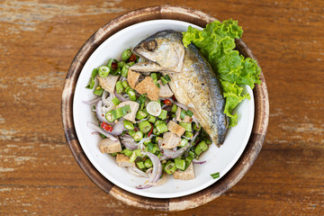 Rice noodle salad with mackerel. Thai food. Top view.