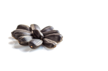 Sunflower Seeds on white background. Helianthus annuus.