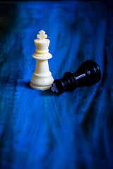 black king fall in front of white king