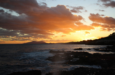 Fototapeta premium Sunset with mountain view and sea