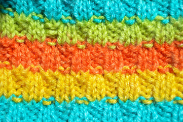 Handmade knitted fabric colored wool background texture