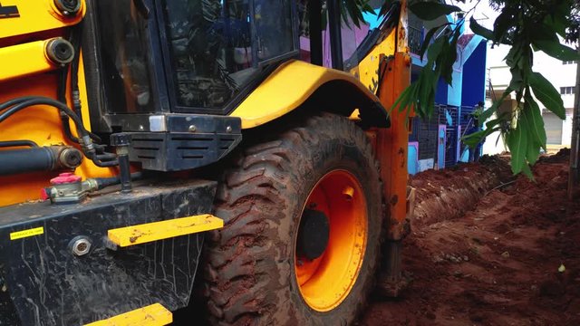 Yellow Bulldozer Scoop Picks Up 4K