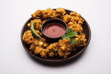 Crispy Corn pakora/pakoda, bhajji, Bhaji, bajji or pattice . served with tomato ketchup