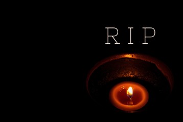 Yellow light candle in modern cup and word 