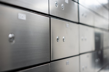 Blurred Metal safe box panel wall. Concept for security and banking protection.